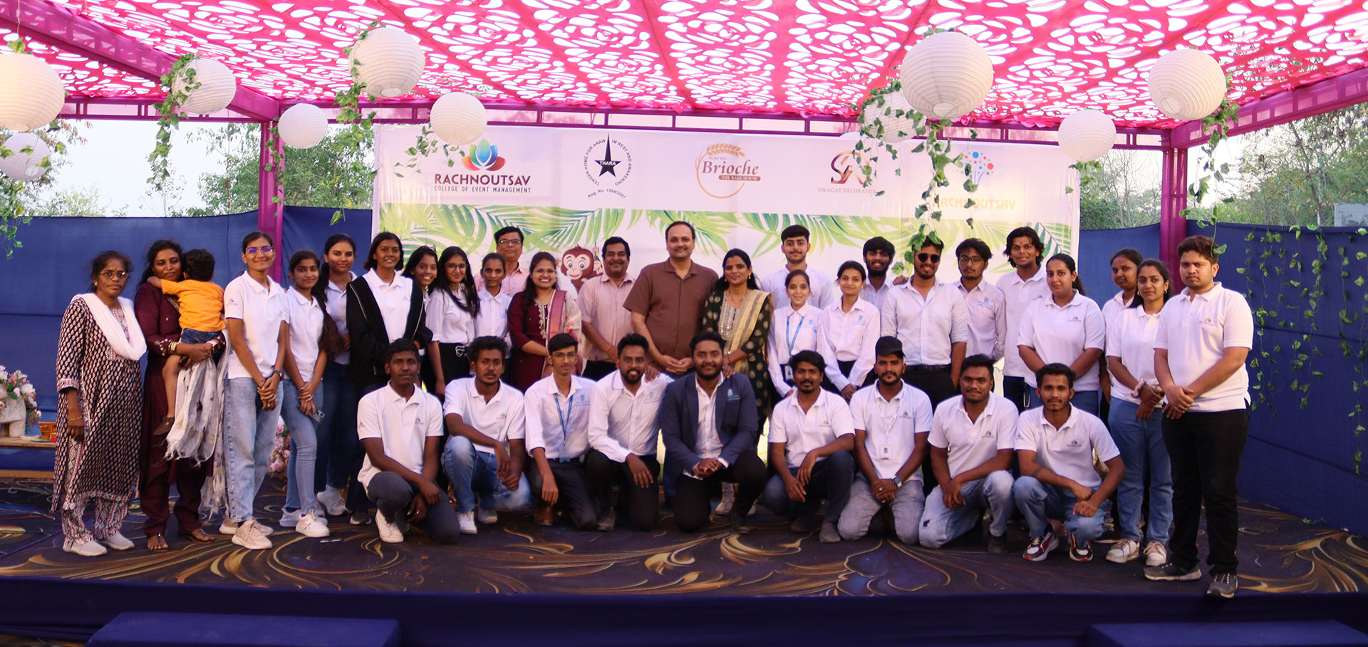 Group photo of students and faculty at Rachnoutsav College of Event Management during a campus event