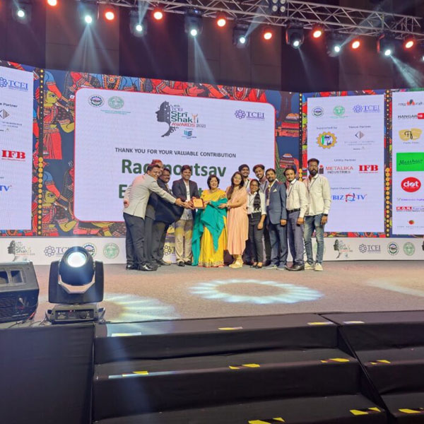 Rachnoutsav College of Event Management receiving an award on stage at Sri Shakti Awards 2023